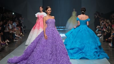 Models walk the runway at the Michael Cinco show during Fashion Forward at Madinat Jumeirah. Ian Gavan / Getty Images