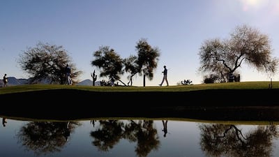 Justin Hicks walks the green on the 12th hole during the final round of the Waste Management Phoenix Open at TPC Scottsdale. Patrick Smith / Getty Images
