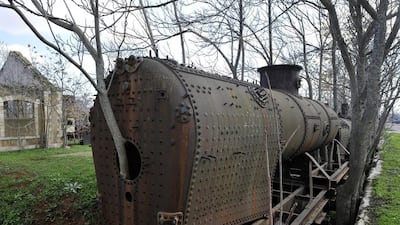 A tree grows through a rusted locomotive at the deserted train station in the town of Rayak in Lebanon’s Bekaa Valley. Wael Hamzeh / EPA