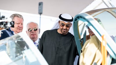 President Sheikh Mohamed views an aircraft during a tour of Dubai Airshow at Dubai World Central. UAE Presidential Court
