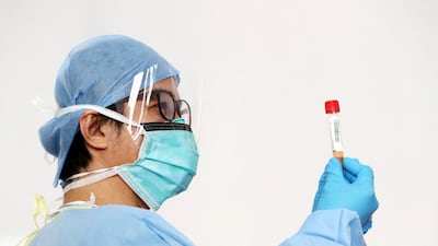 The new screening drive through for COVID-19, Zayed Sports City, Abu Dhabi. Chris Whiteoak / The National