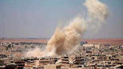 A government air raid on Deraa, southern Syria. AFP