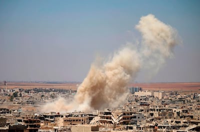 A government air raid on Deraa, southern Syria. AFP