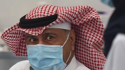 The first Saudi citizen prepares to receive the Pfizer-BioNTech vaccine (Tozinameran) in the capital Riyadh. AFP