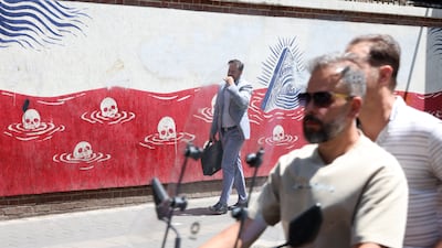 An anti-US mural next to the former American embassy in Tehran. The region has been gripped by a new cycle of violence. EPA