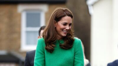 The Duchess of Cambridge wears a green dress by Eponine London as she arrives at Lavender Primary School in support of Place2Be Children's Mental Health Week 2019 on February 5. The look is completed with black tights, LK Bennett boots, a Mulberry Bayswater clutch and Kiki McDonough earrings. Reuters