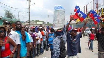 Fans queue outside the Sylvio Cator stadium before Haiti take on the U.S. Virgin Islands their 2014 World Cup qualifier. September 2nd, 2011. (James Montague for The National)