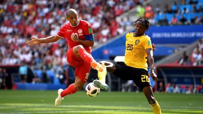 Wahbi Khazri of Tunisia battles for possession with Dedryck Boyata of Belgium. Laurence Griffiths / Getty Images