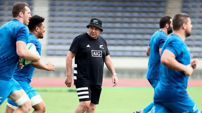 New Zealand head coach Steve Hansen, centre, watches his players during training at Kashiwanoha Park Stadium. AFP