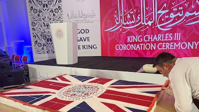 Union Jack-decorated cake stood out among the treats and refreshments. Sinan Mahmoud/ The National