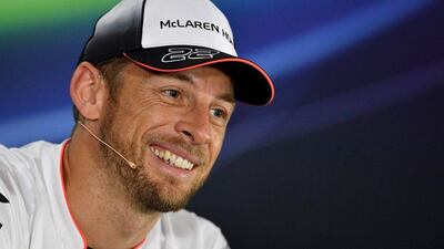 Jenson Button announces his retirement during the media conference for the Abu Dhabi Grand Prix. Andrej Isakovic / AFP