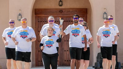 The torch runners carry the flame with pride.