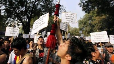 Ethnic Nagas participate in a rally urging the Indian government to expedite the India-Naga political dialogue for a positive solution, in New Delhi, India, Friday, Feb. 25, 2012. India is offering wide autonomy to the Nagas though it has already rejected the demand of the National Socialist Council of Nagaland rebels' for an independent homeland in northeastern India bordering Myanmar, where most of the 2 million Nagas live. The Naga rebels began fighting more than 50 years ago, although a cease-fire has held since it was signed in 1997. (AP Photo/ Mustafa Quraishi)