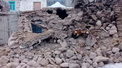 Houses are reduced to rubble after an earthquake hit villages in Baskale in Van province, Turkey, at the border with Iran, Sunday, Feb. 23, 2020. Turkish Interior Minister Suleyman Soylu said numerous people have been killed and several others wounded in Sunday's quake with more people trapped under debris. (IHA via AP)