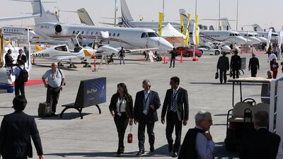 Visitors attend the show in 2014. Pawan Singh / The National
