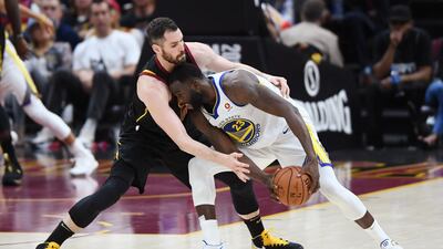Cleveland Cavaliers center Kevin Love pressures Golden State Warriors forward Draymond Green. Ken Blaze / Reuters