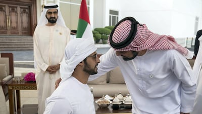 Sheikh Ammar bin Humaid, Crown Prince of Ajman, greets Sheikh Zayed bin Hamdan, during a Sea Palace barza. Seen with Sheikh Mohammed bin Rashid. Mohammed Al Hammadi / Crown Prince Court - Abu Dhabi