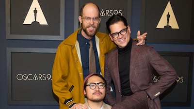 Director Daniel Kwan in front, with director Daniel Scheinert, left, and Taiwanese-American producer Jonathan Wang. EPA