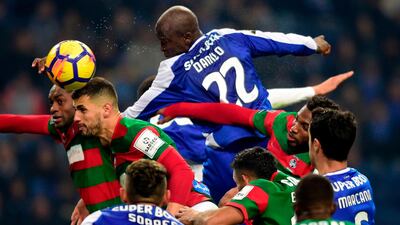 Midfielder Danilo Pereira heads the ball during the Portuguese league football match FC Porto vs Maritimo at the Dragao stadium in Porto. Miguel Riopa / AFP Photo
