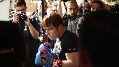 Saul 'Canelo' Alvarez is traveling the route of his mentor, Oscar de la Hoya, and branching out into event promotions. Alexis Cuarezma / AFP
