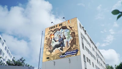 Mexican artist Juandres Vera has painted a 3D mural on a billboard in Cairo of Egyptian superstar Mohamed Ramadan's 'Free Fire' character, Maro. Courtesy Garena