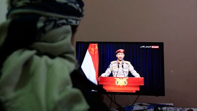 A Houthi spokesman delivers a televised statement on Monday following a missile attack on a US-owned ship in the Gulf of Aden. Weeks before the war in Gaza began, the Yemeni rebels staged a military parade in Sanaa. EPA