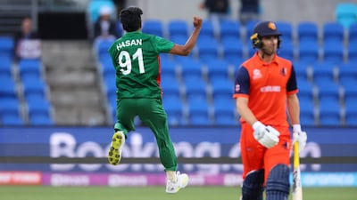 Bangladesh's Hasan Mahmud celebrates the wicket of Tim Pringle. AFP