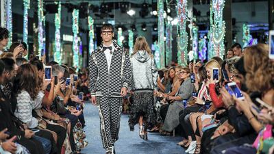 Models walk up and down the catwalk during the Dolce & Gabbana Fashion Show at Dubai Mall.