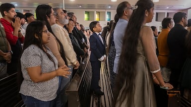 Thousands gather for a Christmas morning service at St Mary's Catholic Church in Dubai. Antonie Robertson / The National