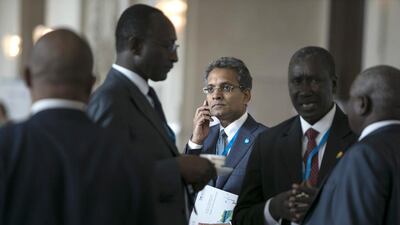 Acwa chief executive Paddy Padmanathan, centre, attends the International Renewable Energy Agency assembly. Acwa Power snapped up a landmark solar contract in Dubai at record low prices. Silvia Razgova / The National