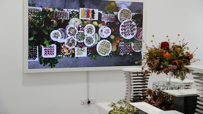 A photograph showing the dining table installation at the exhibition's opening