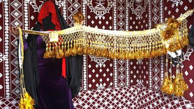 A Rohingya man takes a bucket shower at a IDP camp after sunset November 23, 2012 on the outskirts of Sittwe. Paula Bronstein / Getty Images