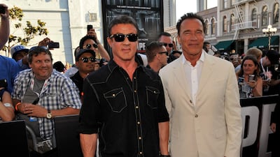 Sylvester Stallone, left, and Arnold Schwarzenegger arrive at the "Escape Plan" special screening on Day 2 of Comic-Con International on Thursday, July 18, 2013 in San Diego, Calif. (Photo by Chris Pizzello/Invision/AP) *** Local Caption *** 2013 Comic-Con - Escape Plan Special Screening.JPEG-0ed10.jpg