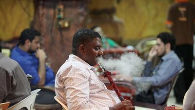 Resident complain that rules regulating shisha cafes are not properly enforced. Pawan Singh / The National