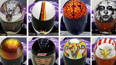 Some of the more colourful Olympic skeleton helmets include American Katie Uhlaender's, bottom right, patriotic example and Canadian Sarah Reid's, top right, zombie-inspired digs. AP Photo