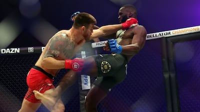 Johnny Eblen lands a left hand on Fabian Edwards during their Bellator middleweight title bout. Chris Whiteoak / The National