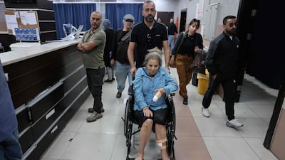 US photojournalist Heidi Levine in hospital in Ramallah after being attacked by Israeli settlers as she photographed Palestinian farmers harvesting olives in Abu Falah. AFP