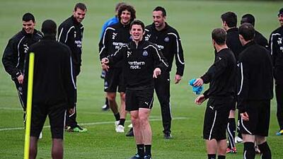 Newcastle United’s Joey Barton, centre, shares a laugh during training yesterday.