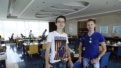 Russian tourists Vachislav Murko, left, and Stanislav Volkov at Oceanic hotel in Khor Fakkan. Sarah Dea / The National
