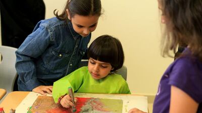 Children at an art class at the Emirates College for Advanced Education. Ravindranath K / The National