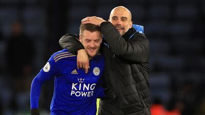 Manchester City manager Pep Guardiola hugs Leicester City's Jamie Vardy at the end of the the game. PA