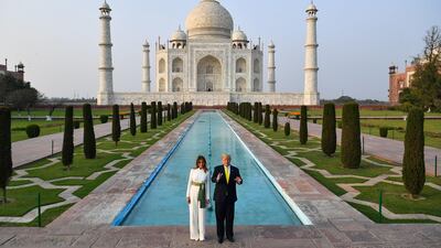 US President Donald Trump and First Lady Melania Trump stand in front of Taj Mahal.