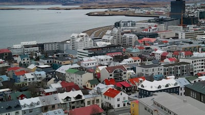 Traffic moves around the buildings in the Icelandic capital Reykjavik. Matt Cardy / Getty Images