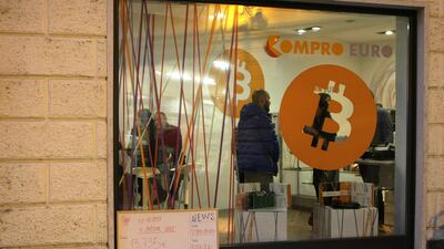 A bitcoin crypto currency shop in Rovereto, northern Italy. The cryptocurrency could well top $20,000, analysts say. Pierre Teyssot/AFP