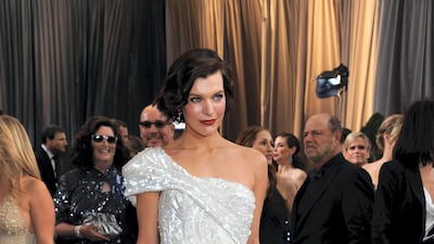 2012: Milla Jovovich wears Elie Saab to the 84th Annual Academy Awards on February 26, 2012 in Hollywood, California. AFP