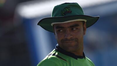 Rashid Khan looks on during a match between Kabul Eagles and Band-e-Amir Dragons during the Shpageeza Cricket League T20 tournament at the Kabul International Cricket ground in Kabul. Wakil Kohsar / AFP