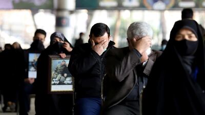 Mourners react during the commemoration Qassem Suleimani's assassination. West Asia News Agency via Reuters