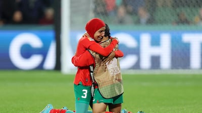 Nouhaila Benzina and Sofia Bouftini of Morocco celebrate advancing to the knockout stage of the Women's World Cup. Getty