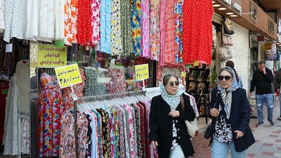 Iranians at a market in Tehran on the day US President Donald Trump announced an extension of the ceasefire. EPA
