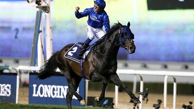 Jack Hobbs, ridden by William Buick, races to the finish line to win the 8th horse race at the Longines Dubai Sheema Classic, at the Meydan Racecourse in Dubai. Pawan Singh / The National